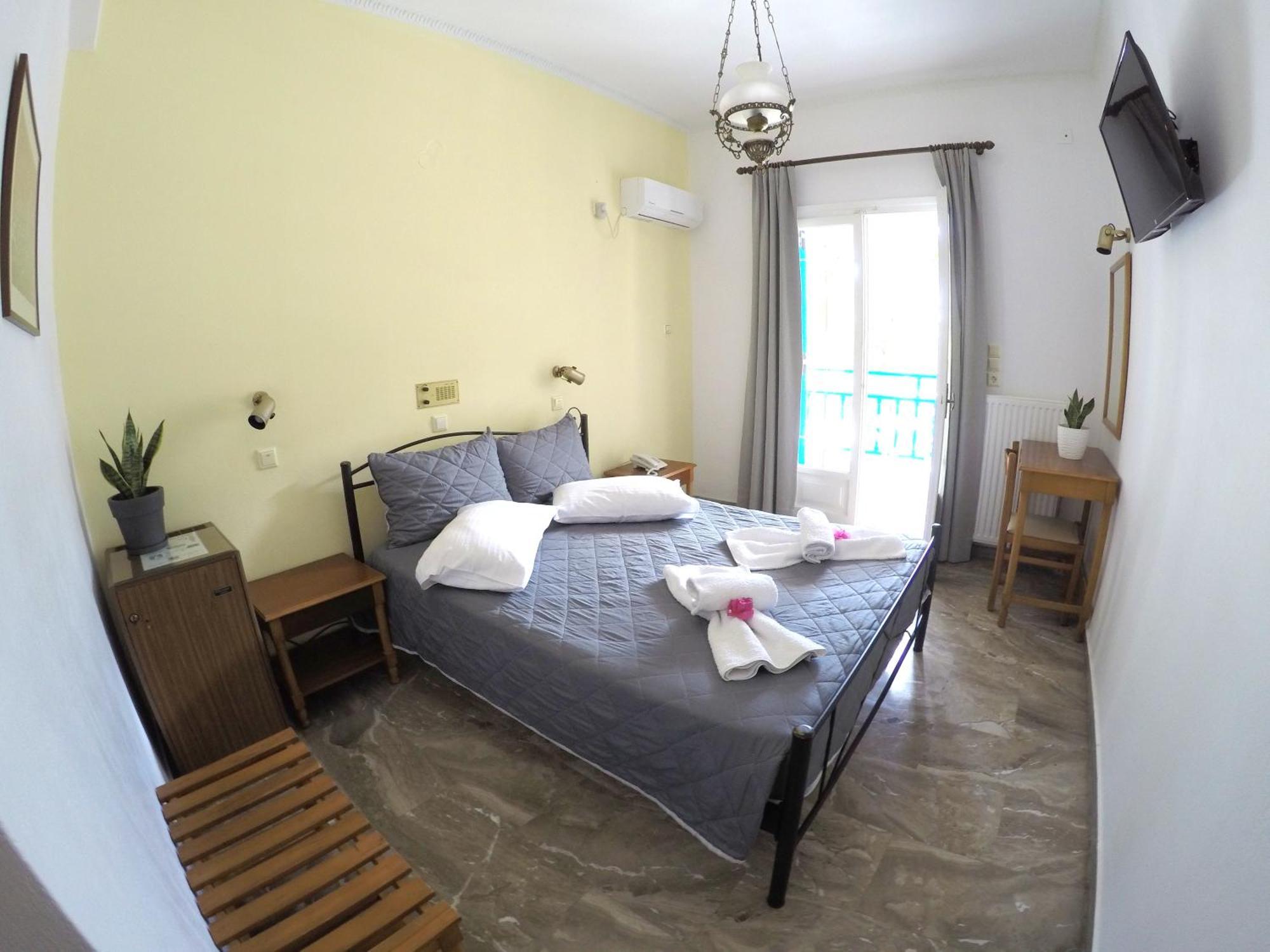 Hotel Zeus Kamári Quarto foto