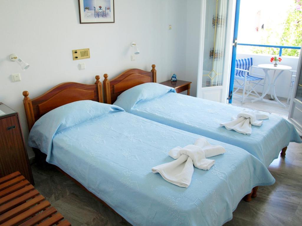 Hotel Zeus Kamári Quarto foto